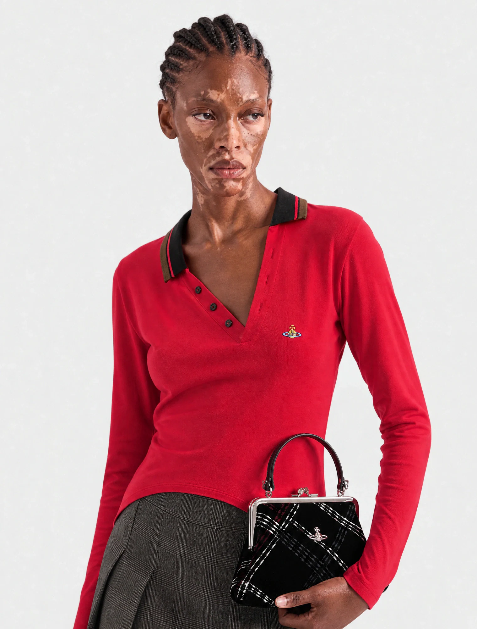 AI-generated on-model image: red knit polo with a mini bag