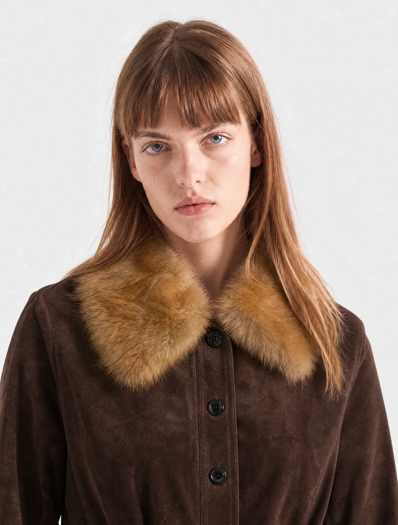 AI-generated on-model image: suede jacket with a fur collar, close-up portrait