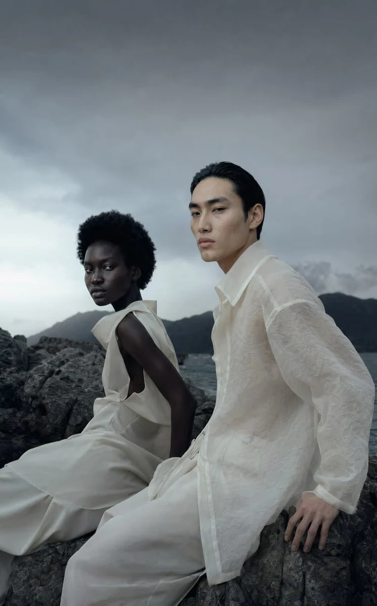 Velva campaign image shot against a coastal landscape