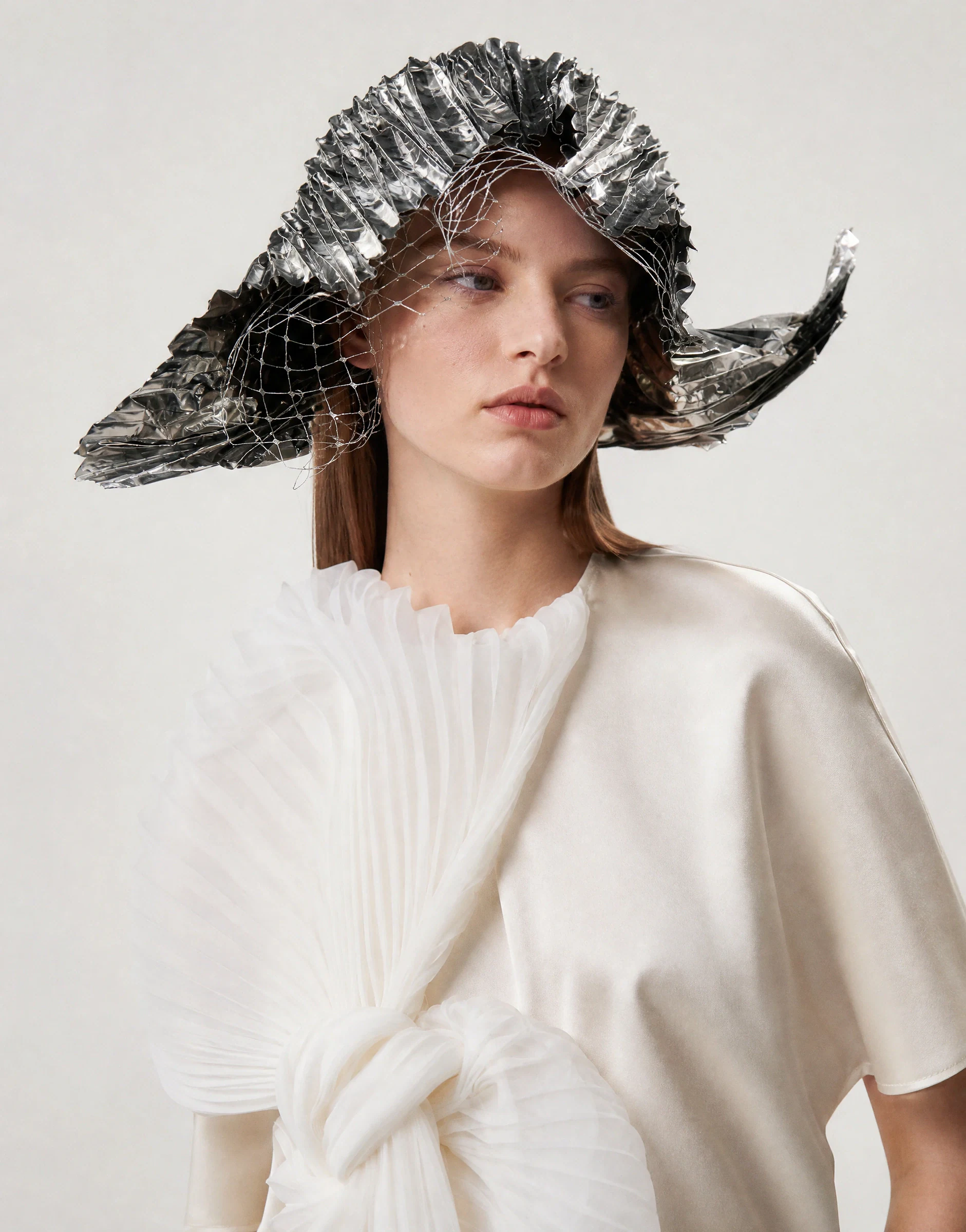 AI-generated fashion model wearing a knitted garment, shot as studio editorial