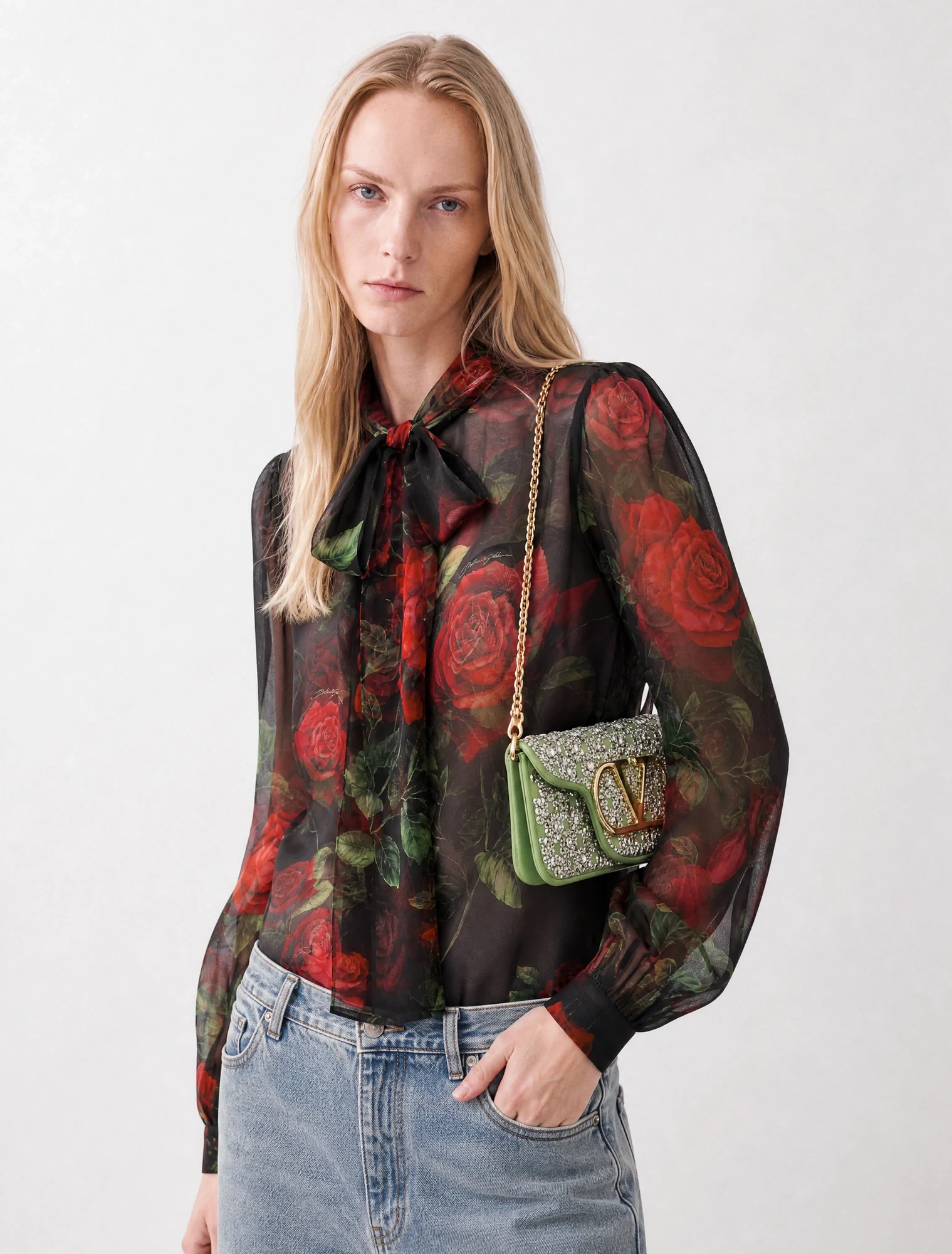 AI-generated on-model image: rose-print chiffon blouse worn with denim