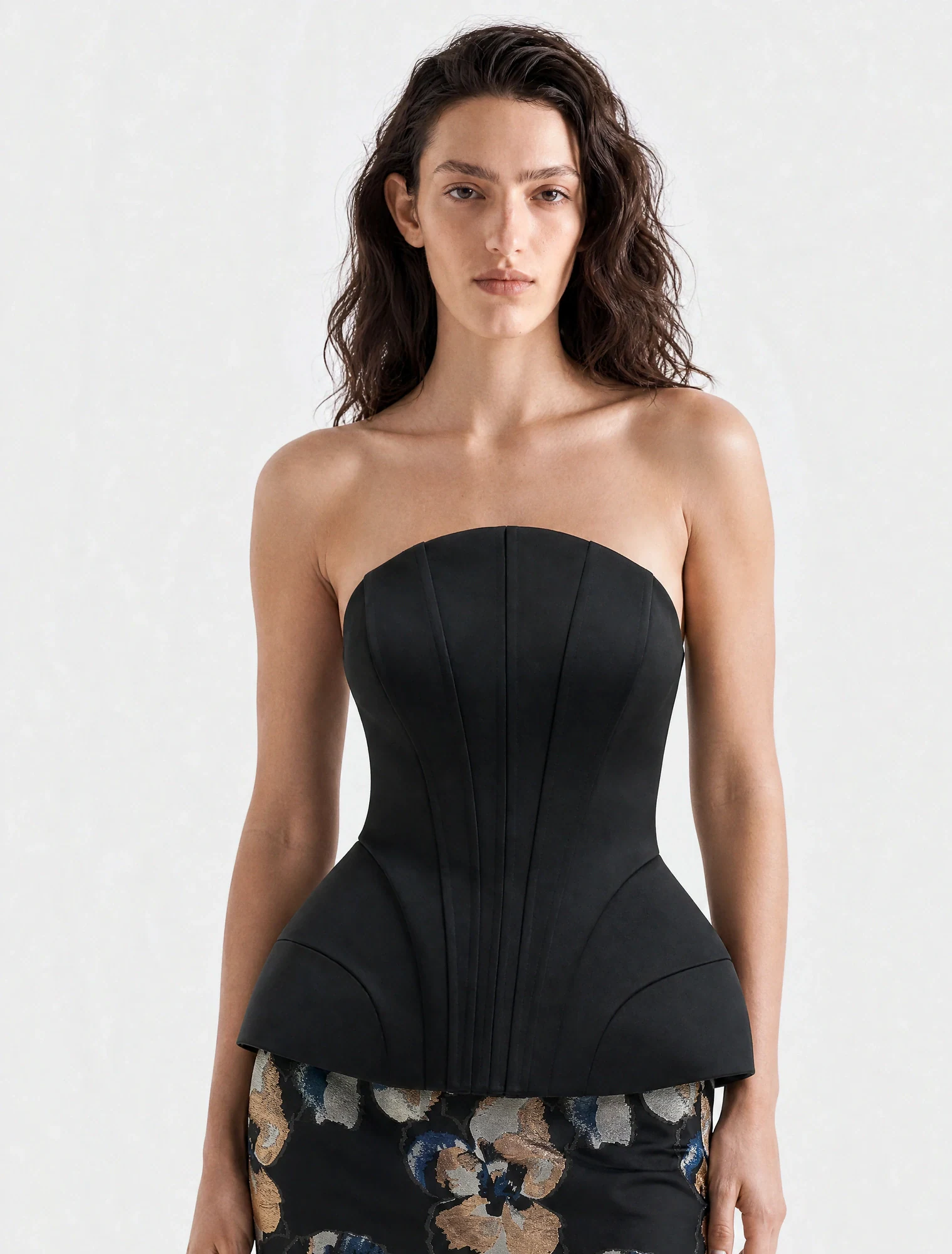 AI-generated on-model image: black corset top with a floral midi skirt