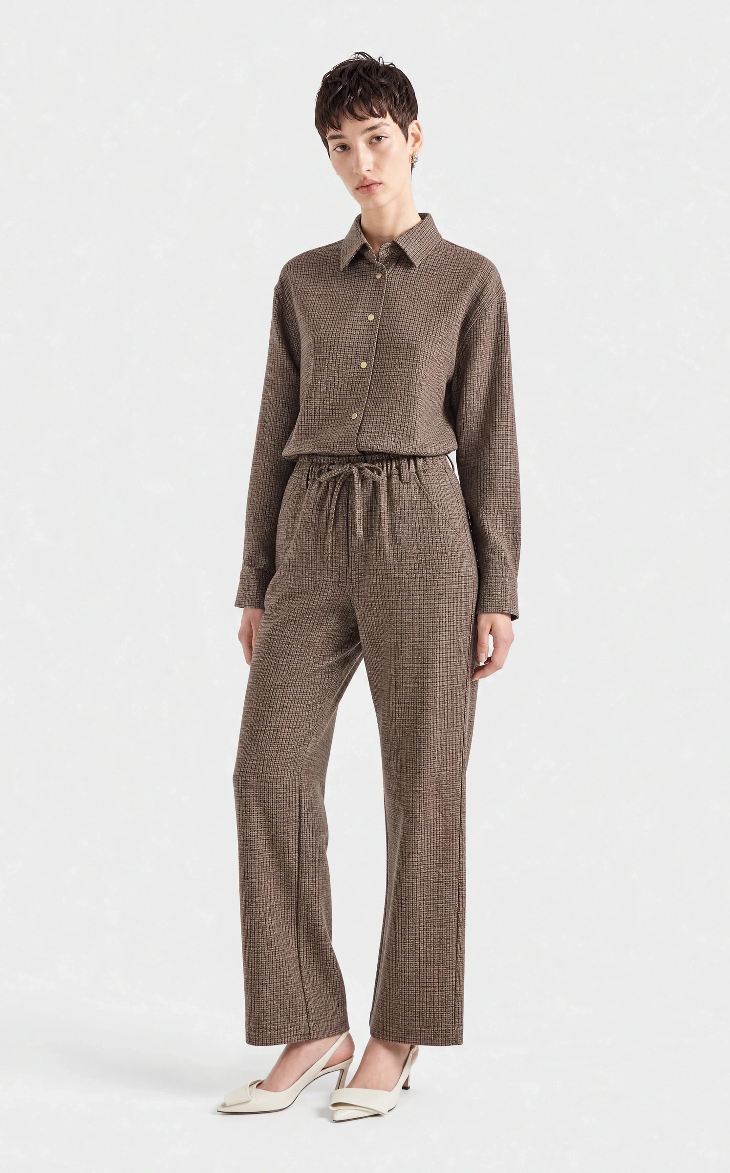 Maison Aro PDP image — brown checked shirt and trouser co-ord, three-quarter view