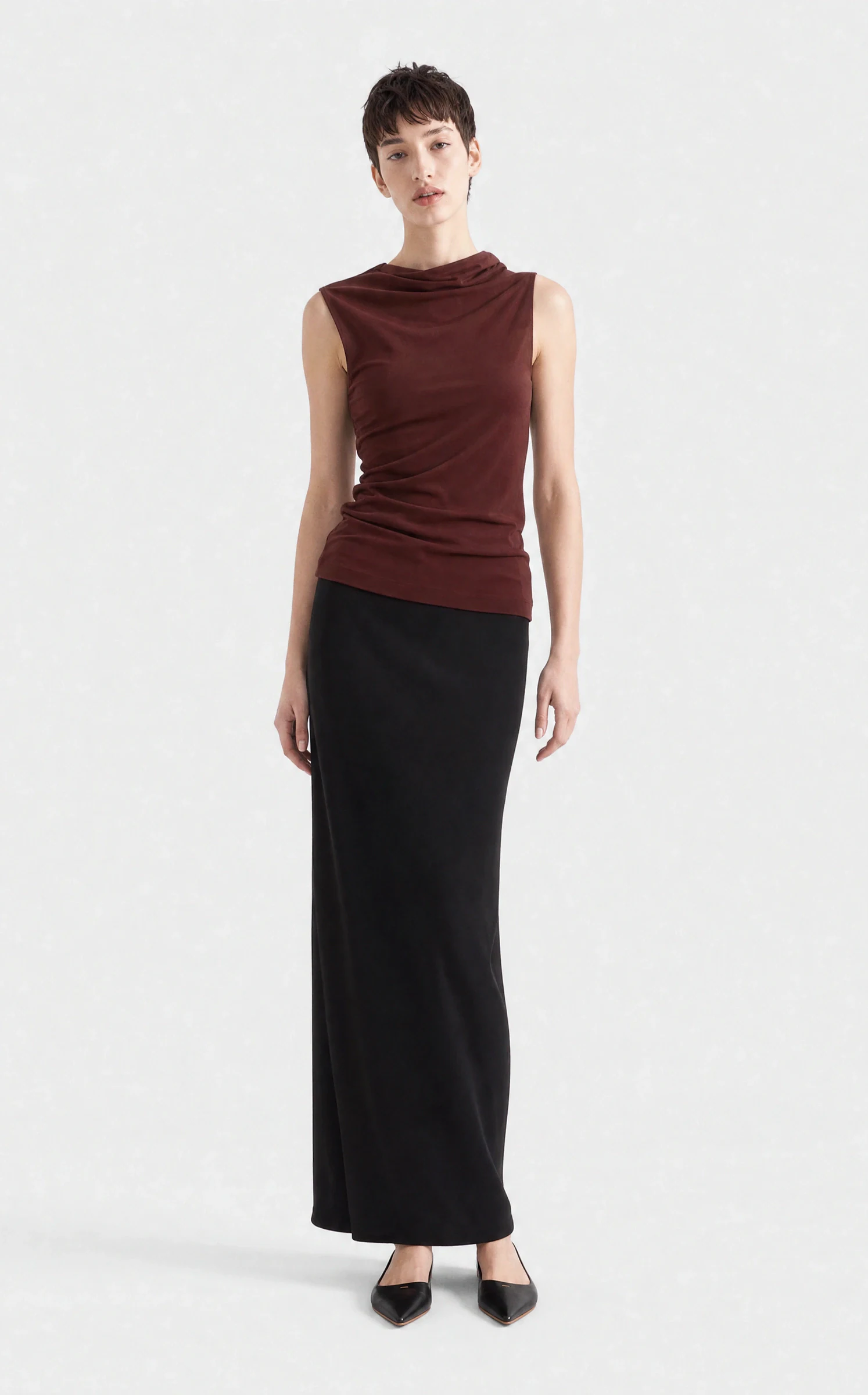 Maison Aro PDP image — burgundy draped top with a black maxi skirt, front view