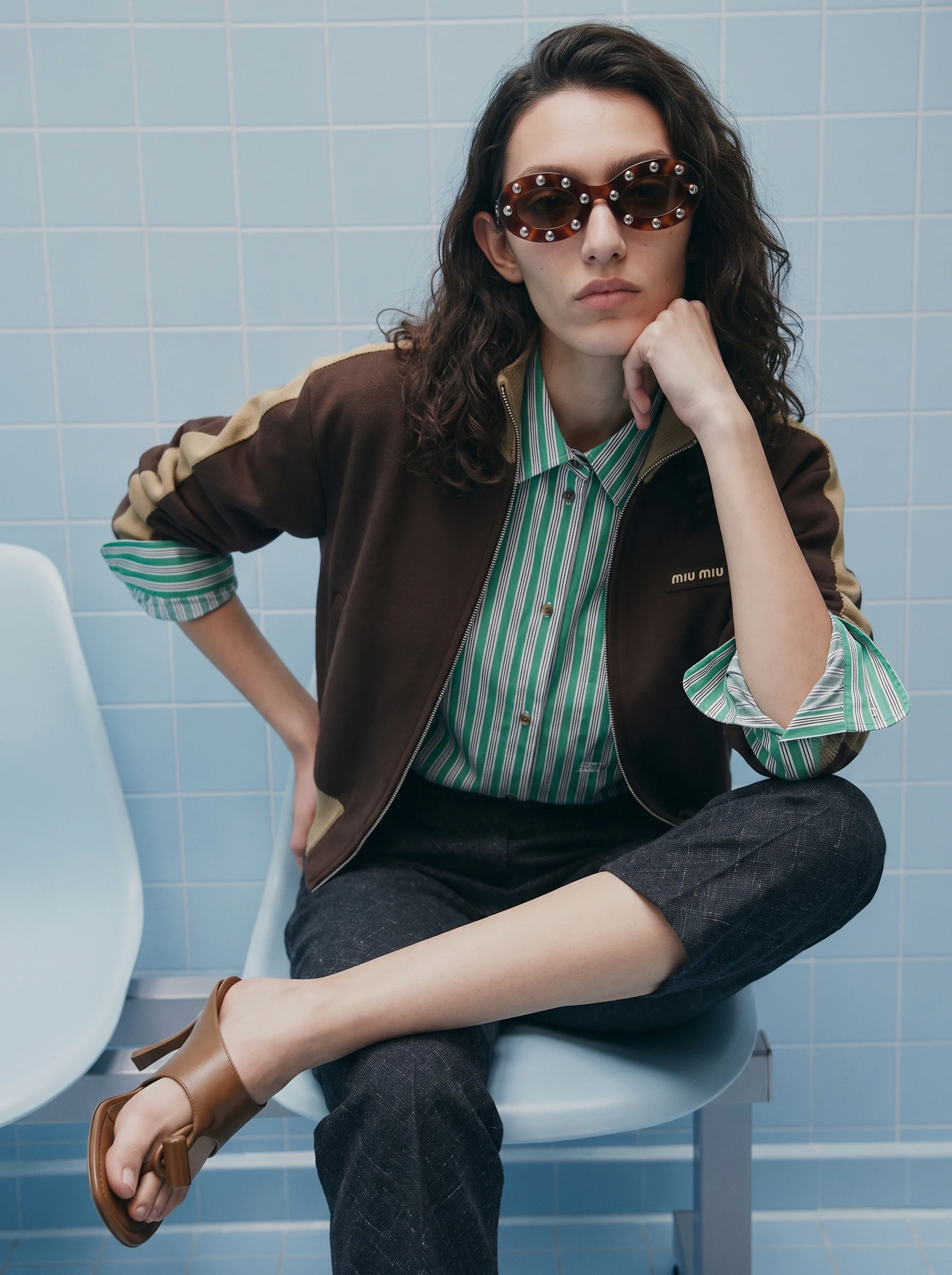 Bomber jacket worn by a brand’s custom AI fashion model in a street campaign shot